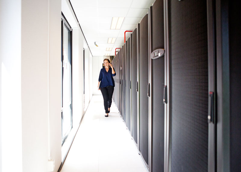 Woman walking in dataroom