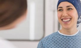 Woman in hospital gown